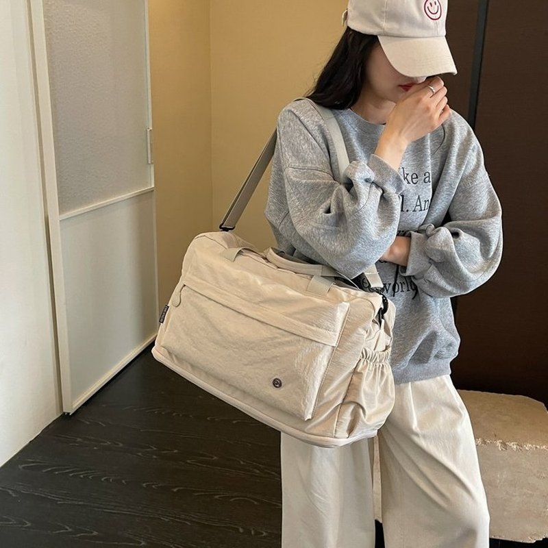 กระเป๋าเดินทางผู้หญิงแบบดัฟเฟิ - Weekender Bag Duffle บทวิจารณ์และราคา
